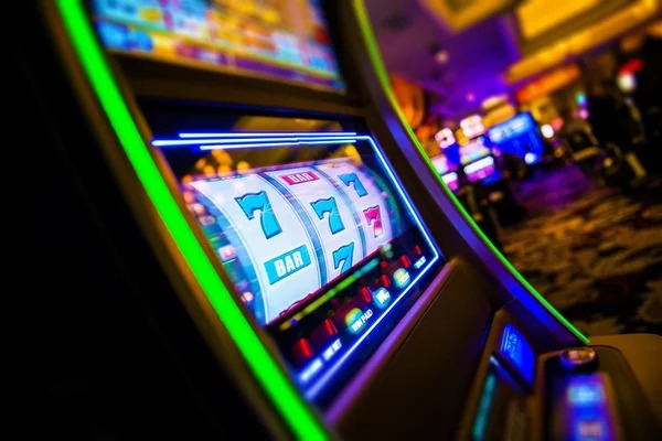 Bonanza Gold slot interface on dewatogel rtp showing five reels and live Liga 1 ticker
